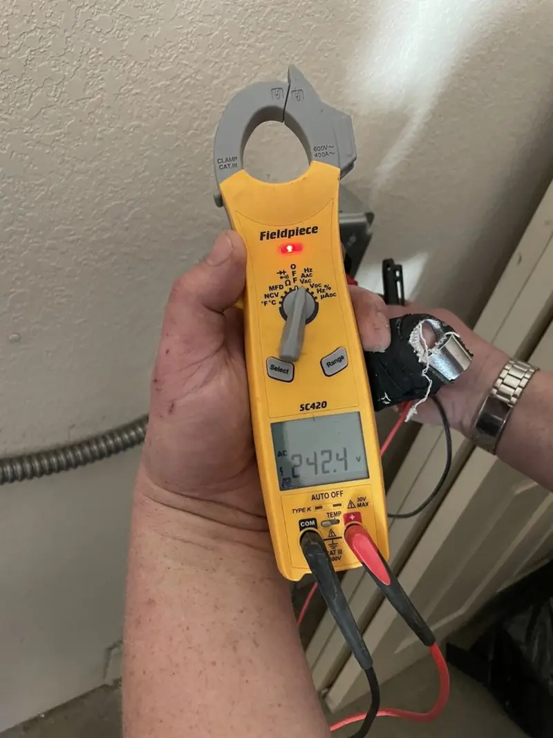 Voltage testing with clamp meter during Generator Installation in Saratoga Springs